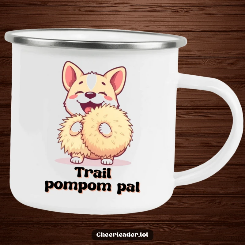 Funny dog camping mug showing a happy dog barking enthusiastically while holding a giant pom-pom, perfect for adventures.