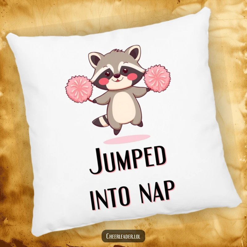 Funny pillow showcasing a blushing raccoon jumping rope with two oversized pom-poms.