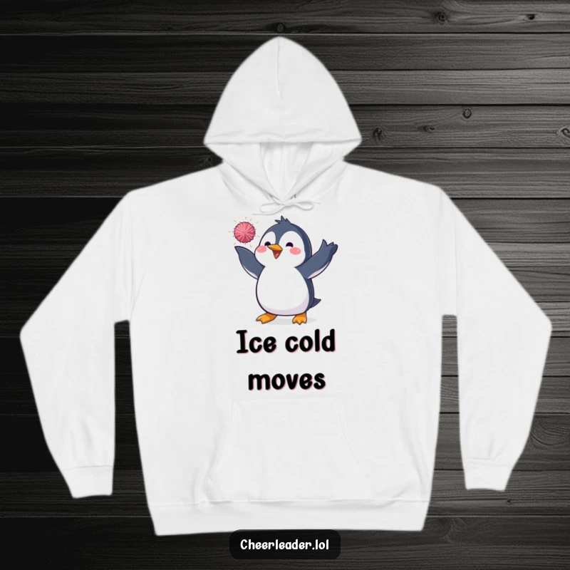 Funny hoodie with a penguin in a dynamic pose, tossing a sparkly pom-pom through the air, radiating charm and performance energy.