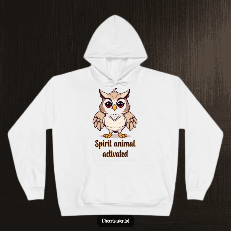 Funny hoodie featuring a proud and energetic owl in a cheerleader pose, offering warmth and spirited fun, a great funny gift.