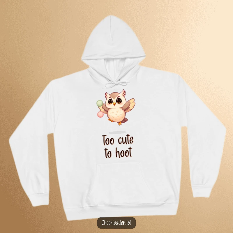 Funny hoodie print of a giggling owl in a dynamic pose, shaking colorful fluffy pom-poms with infectious, joyful energy.