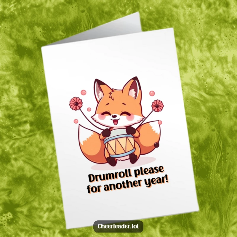 Funny Free Printable Fox Birthday Card: A joyous fox with pom-poms energetically playing a tiny drum, celebrating.