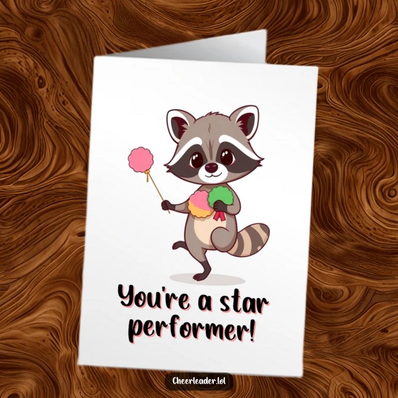 Funny Free Printable Congratulations Card: A curious raccoon expertly balances on one leg, pom-poms ready, celebrating success. Hilarious downloadable.