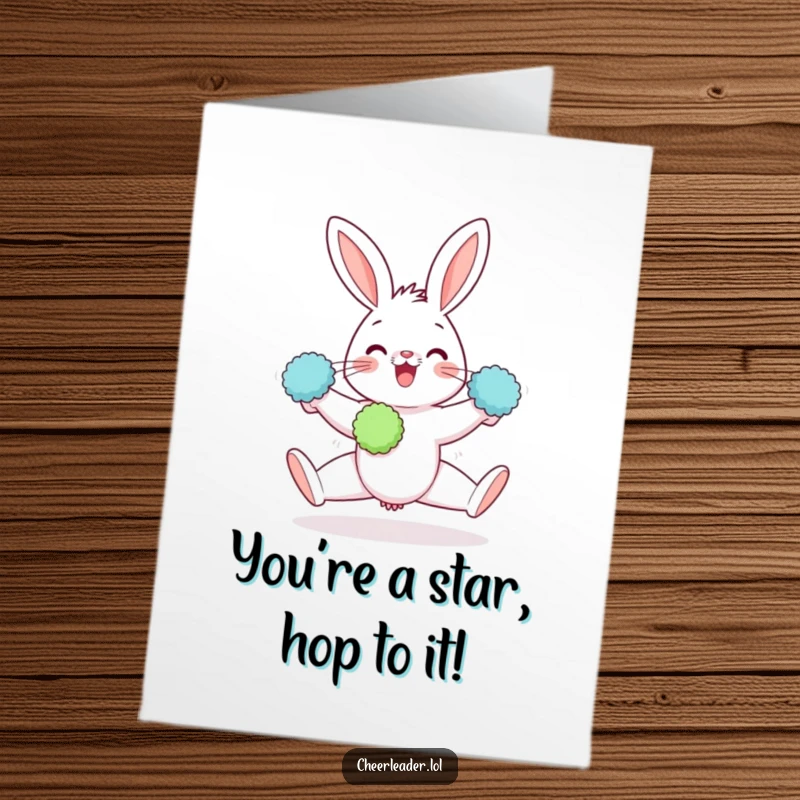 Funny Free Printable Congratulations Card: A happy rabbit in a split pose, clutching two pom-poms, ready to celebrate success.