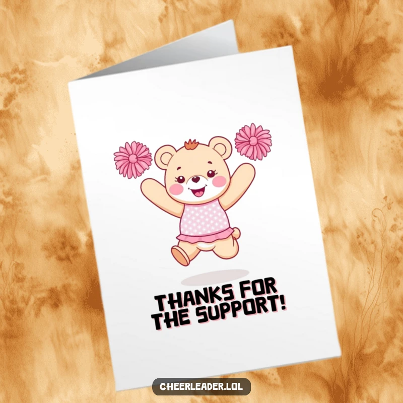 Funny Free Printable Thank You Card: Happy bear in sparkly uniform jumping with pom-poms, expressing thanks.