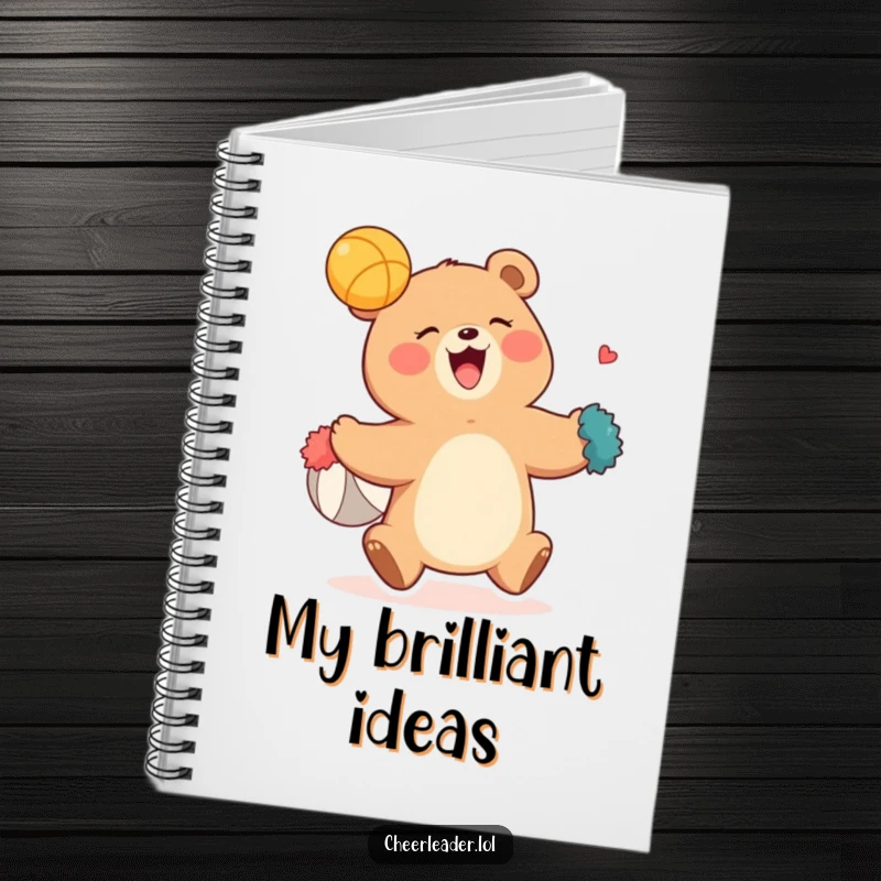 Funny notebook cover with a bear holding pom-poms, ready to catch a ball, symbolizing capturing ideas with humor and enthusiasm.