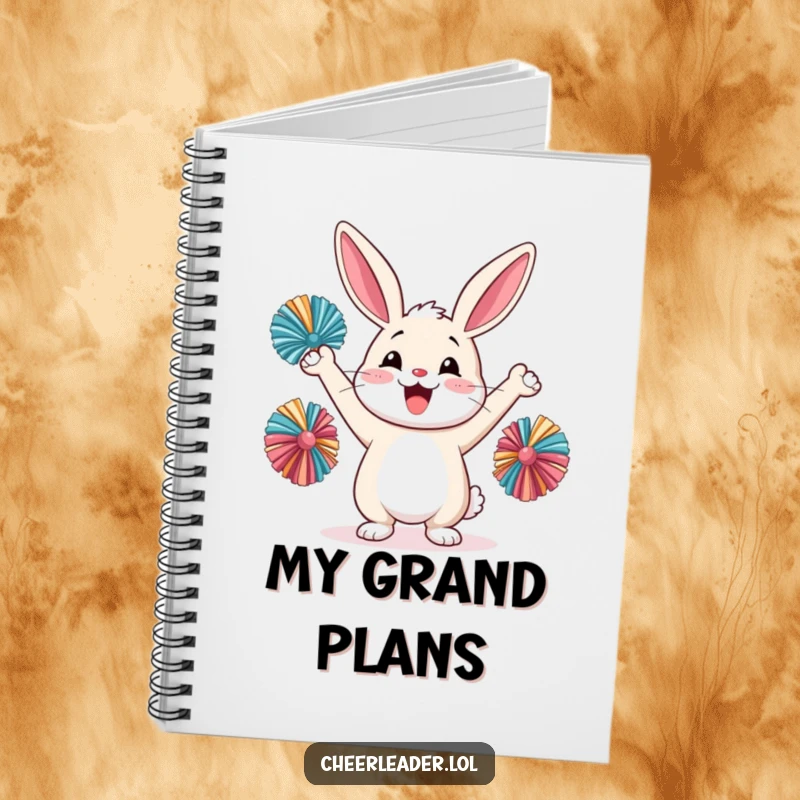 Funny happy rabbit cheering with pom-poms, open notebook, creative design, cute animal.