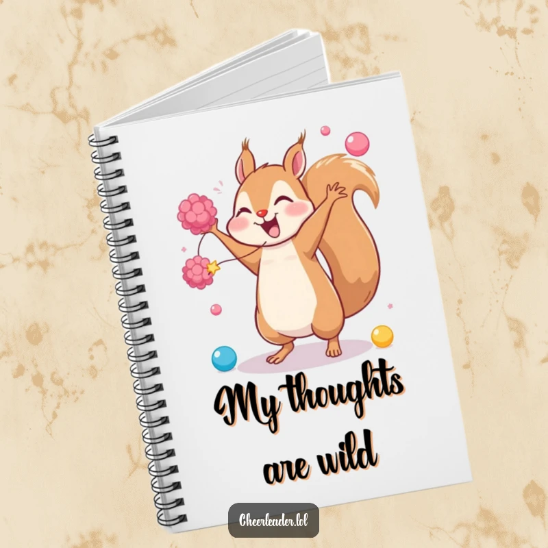 Funny notebook featuring a giggling squirrel doing a cartwheel with pom-poms, ideal for jotting down ideas with energetic and cheerful flair.