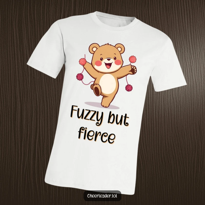 Funny t-shirt with a happy bear doing a powerful high kick, complete with vibrant yarn pom-poms. Expresses pure joy and energy.