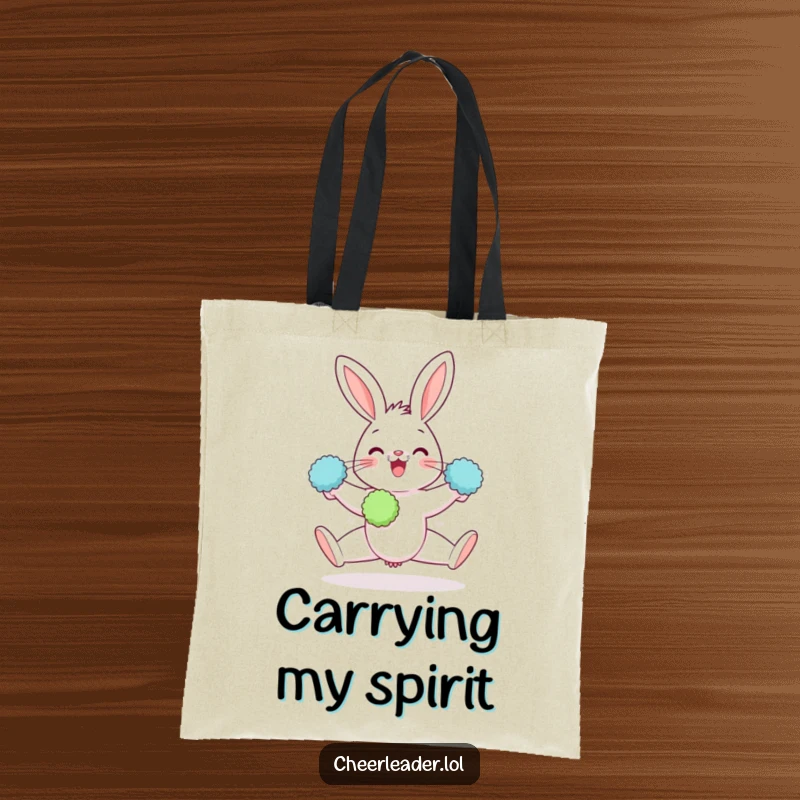 Funny tote bag with a gleeful rabbit performing a split, holding pom-poms, symbolizing flexibility and fun.